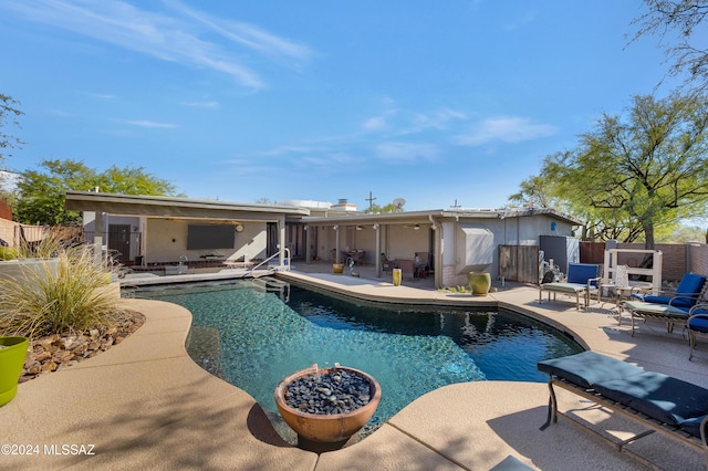 view of pool featuring a patio area