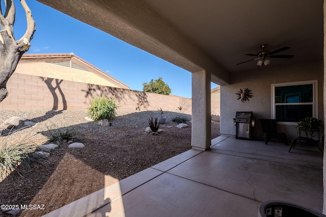 view of patio / terrace featuring ceiling fan and area for grilling