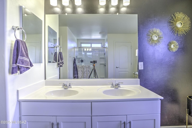 bathroom featuring vanity and walk in shower