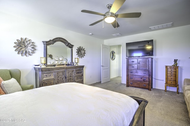 bedroom featuring ceiling fan and light colored carpet