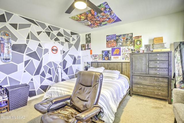 bedroom featuring ceiling fan and light carpet