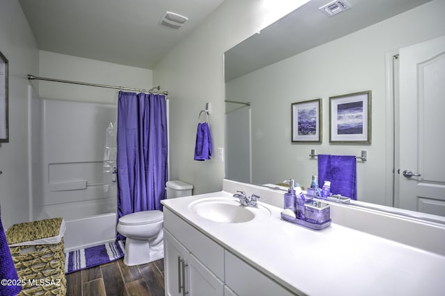 full bathroom featuring toilet, shower / bath combo, and vanity