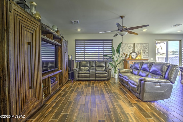 unfurnished living room featuring ceiling fan