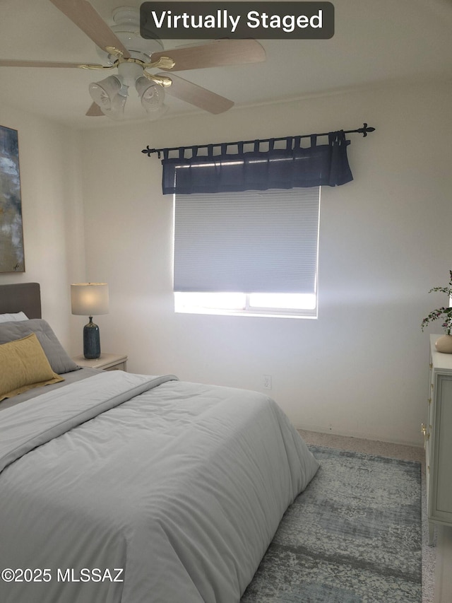 bedroom featuring ceiling fan