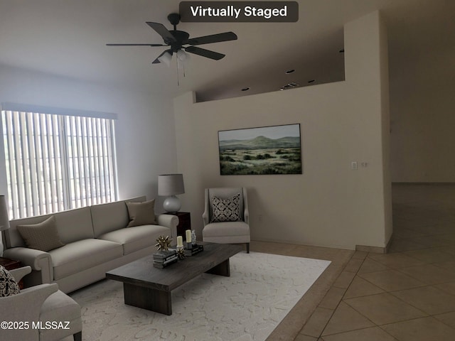 living room featuring ceiling fan and light tile patterned floors