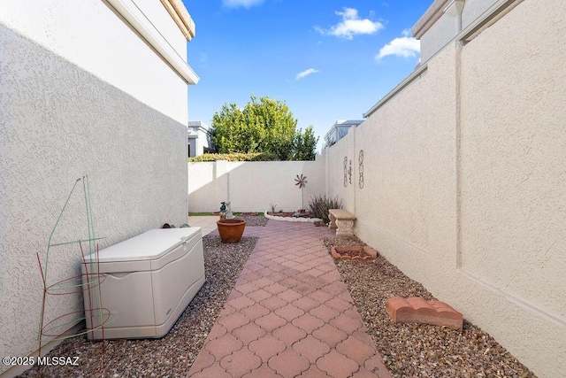 view of patio / terrace featuring ceiling fan and a grill