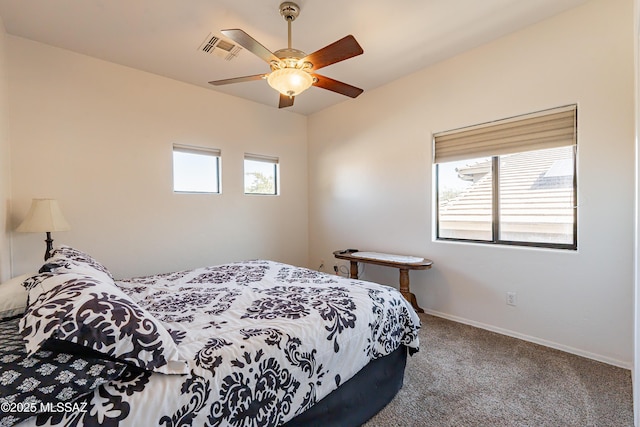 carpeted bedroom with ceiling fan