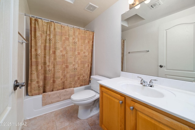 full bathroom featuring vanity, toilet, tile patterned flooring, and shower / bath combo