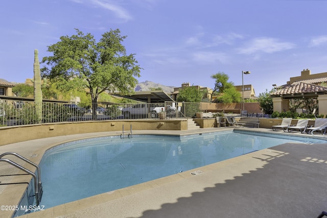 view of pool featuring a patio