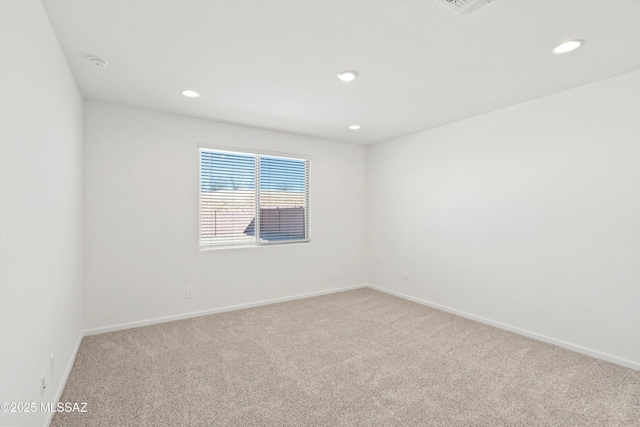 spare room with carpet