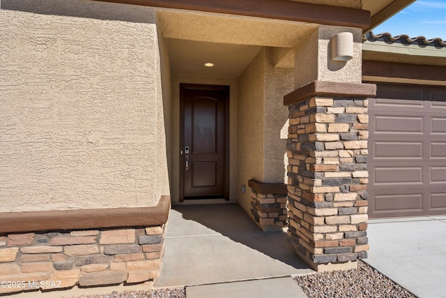 entrance to property with a garage