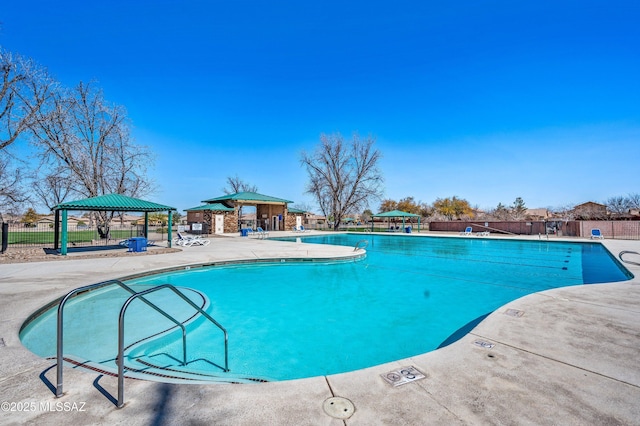 view of pool featuring a gazebo and a patio