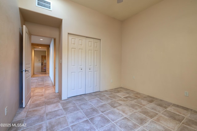 unfurnished bedroom with a closet