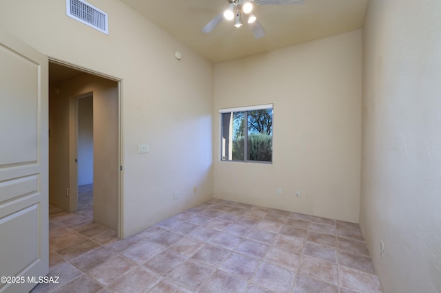 unfurnished room featuring ceiling fan