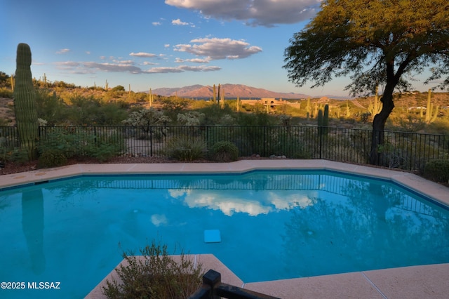 view of pool featuring a mountain view