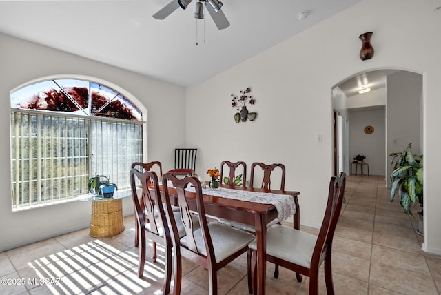 dining area with ceiling fan and light tile patterned floors