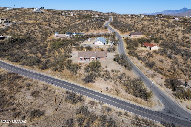 drone / aerial view featuring a rural view and a mountain view