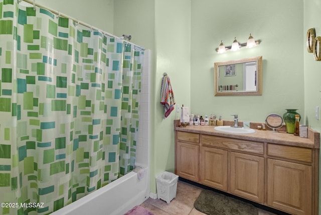 full bathroom with tile patterned flooring, shower / tub combo, and vanity
