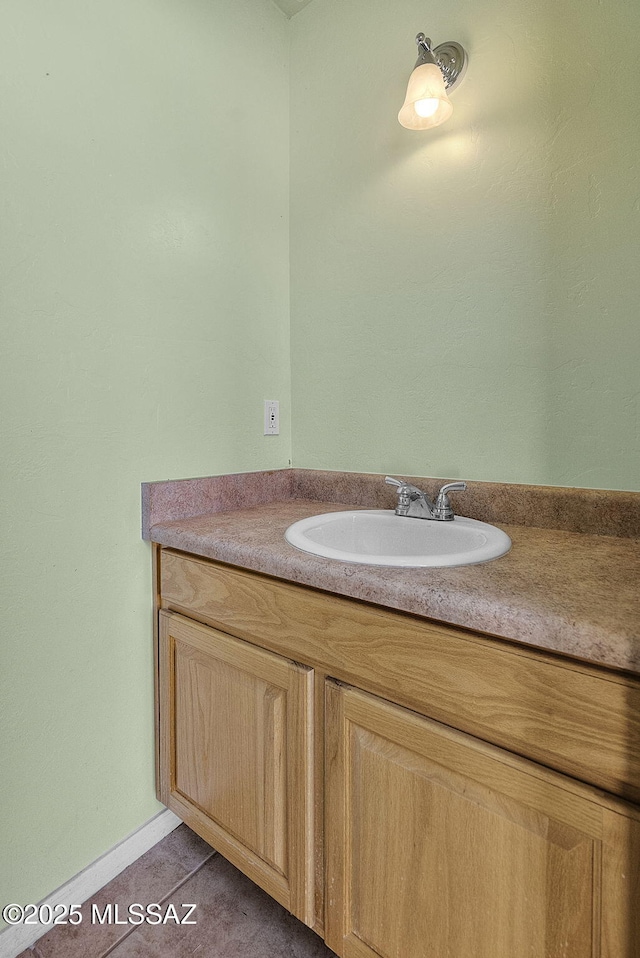 bathroom with tile patterned floors and sink