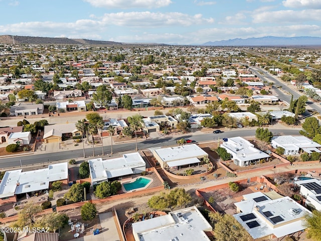 birds eye view of property featuring a mountain view