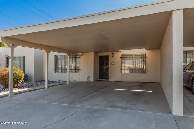 entrance to property with a carport