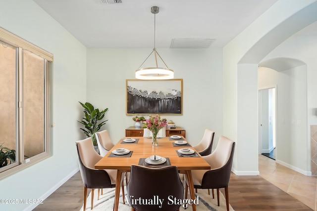 dining area with tile patterned floors