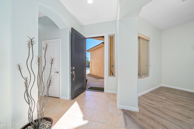 foyer entrance featuring light tile patterned floors