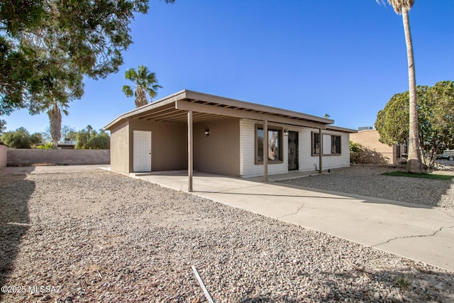 rear view of house featuring a patio area