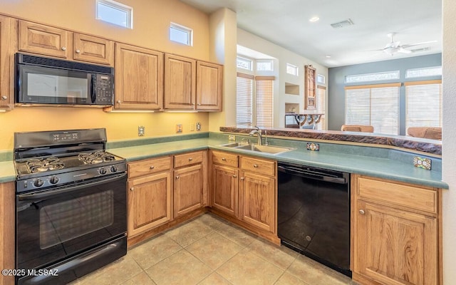 kitchen with black appliances, light tile patterned floors, ceiling fan, and sink