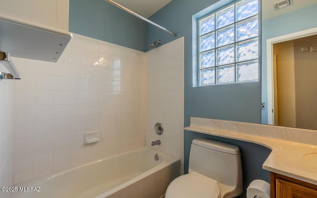 full bathroom with toilet, vanity, and shower / bathtub combination