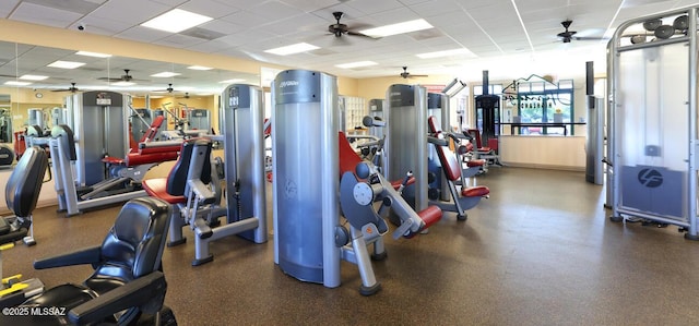 workout area with a paneled ceiling