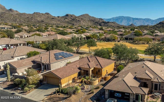 bird's eye view with a mountain view