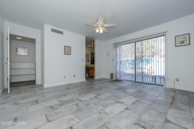 unfurnished living room with ceiling fan