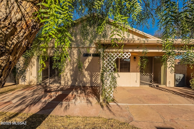 view of front facade with a patio area