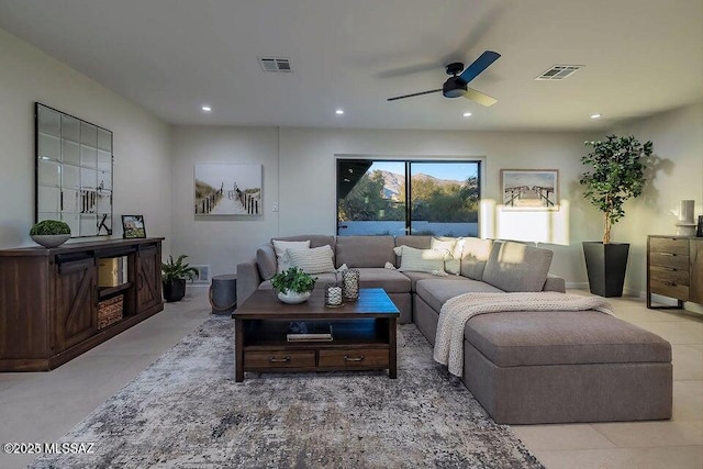 living room with ceiling fan