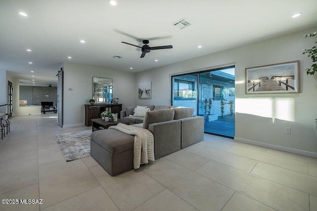 living room with ceiling fan