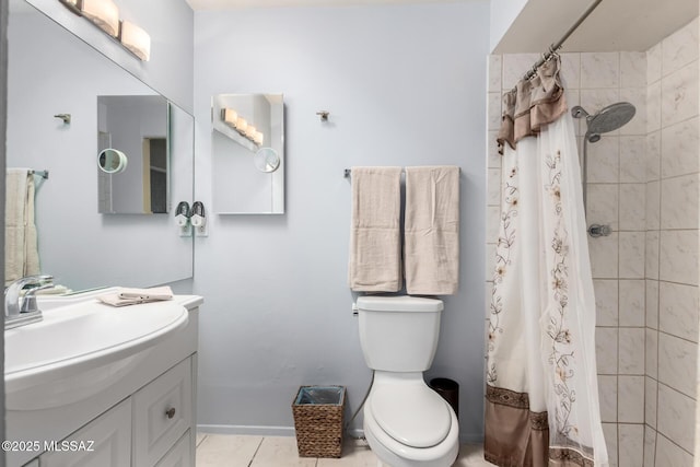 bathroom featuring walk in shower, tile patterned floors, vanity, and toilet