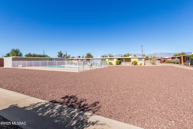 view of property's community featuring a pool