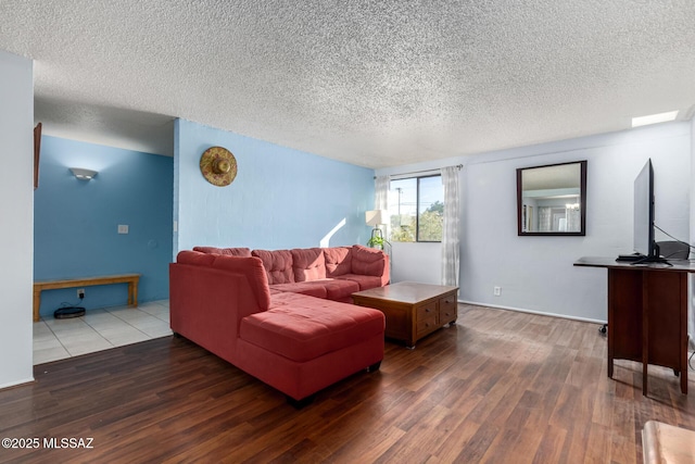 living room featuring a textured ceiling and dark hardwood / wood-style flooring