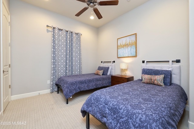 bedroom with ceiling fan and carpet