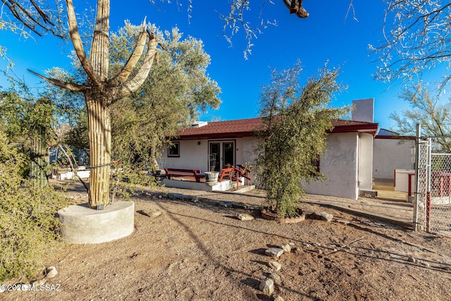 rear view of house with a patio area