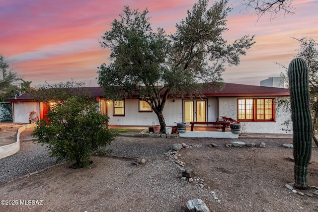 ranch-style house featuring a patio area