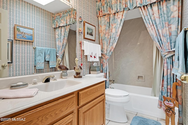 full bathroom featuring tile patterned floors, toilet, vanity, and shower / tub combo with curtain