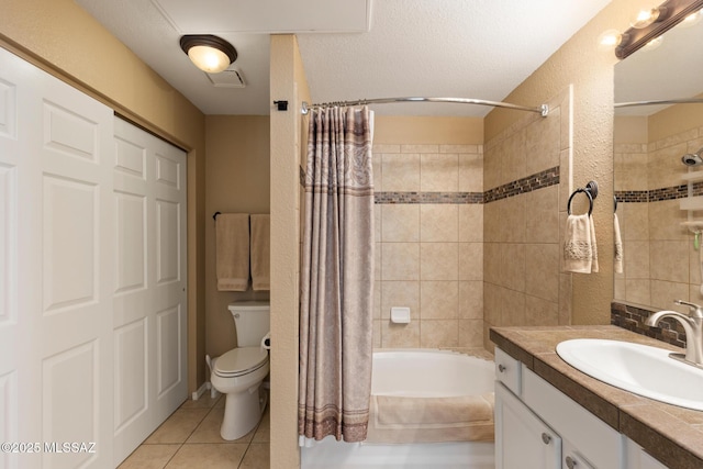 full bathroom with shower / tub combo, toilet, tile patterned flooring, and vanity