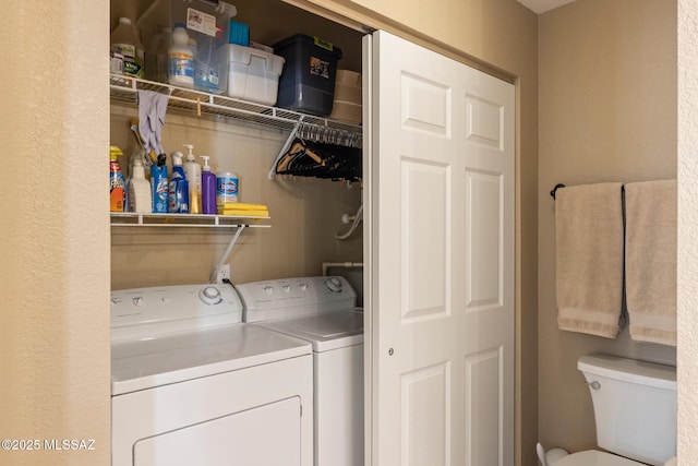 laundry area featuring separate washer and dryer