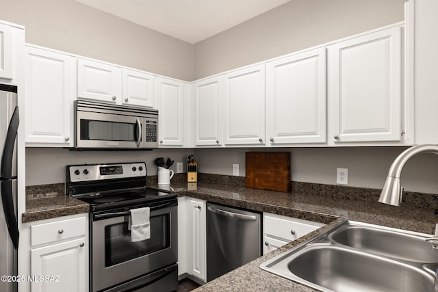 kitchen featuring sink, white cabinetry, and appliances with stainless steel finishes