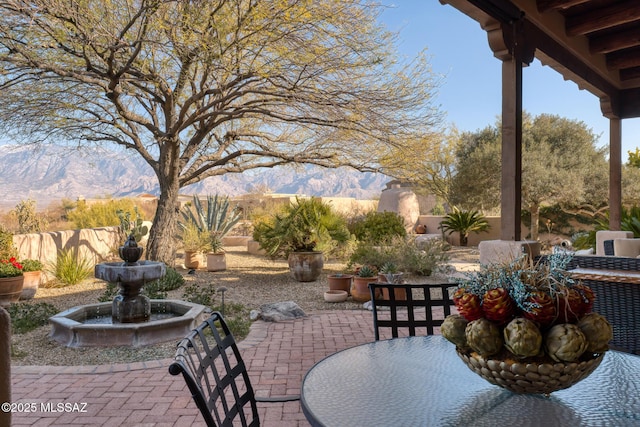 view of patio with a mountain view