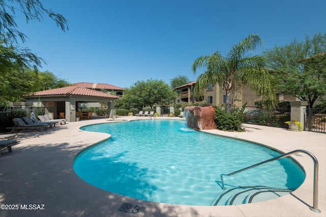 view of pool with pool water feature, a patio area, and a gazebo