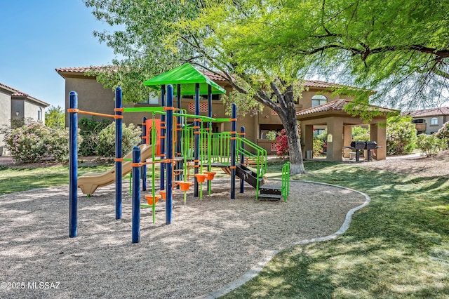 view of playground with a yard