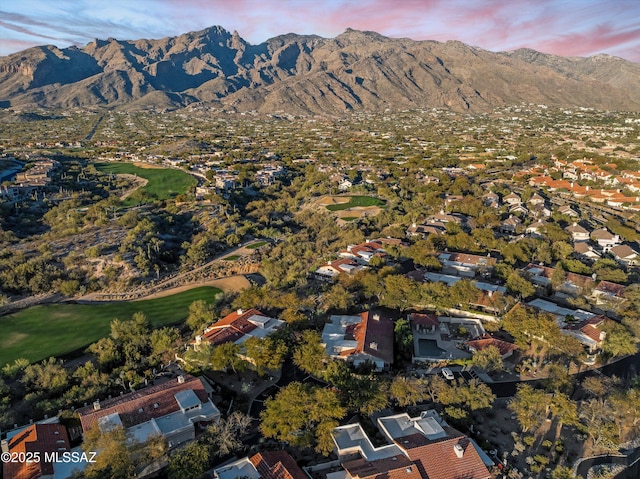 aerial view at dusk with a mountain view